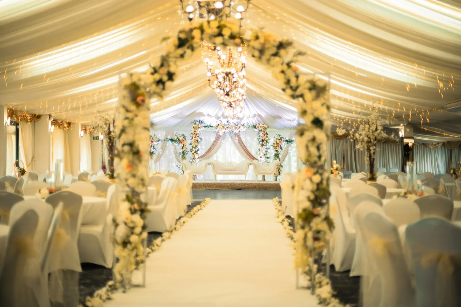 Floral aisle under the marquee